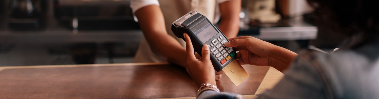 a person making a debit or credit card payment